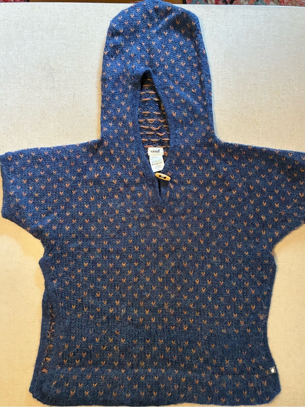 Oeuf Navy baby Alpaca Hooded Poncho with Orange Stitch detail